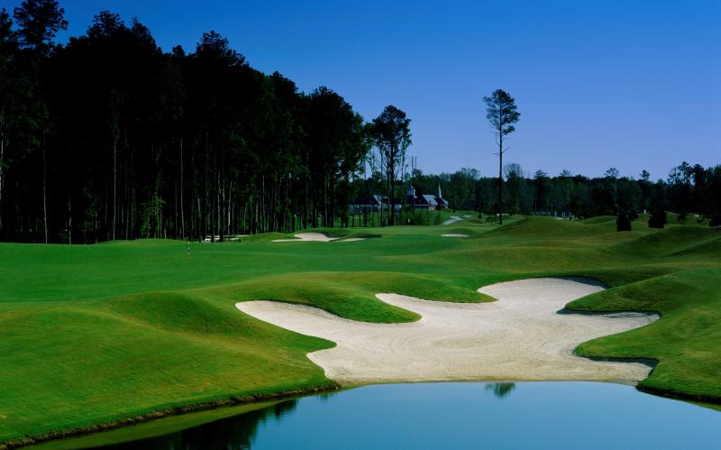 Experience the scenic beauty of Virginia Beach's picturesque golf courses.